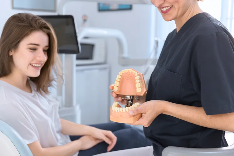 Dental Implants Versus Dentures