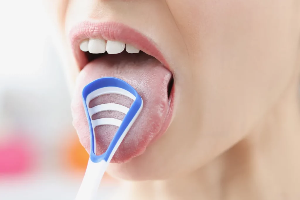 how to use a tongue scraper