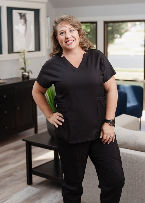 A woman is happily smiling