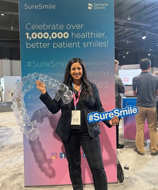 Doctor Sara is smiling and having a good time at suresmile conference
