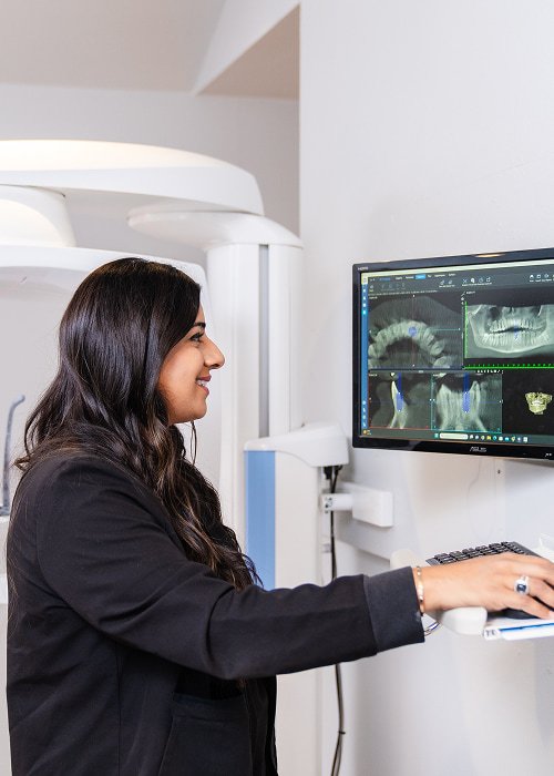 Dr. Sara Mahmood working with a digital jaw scan